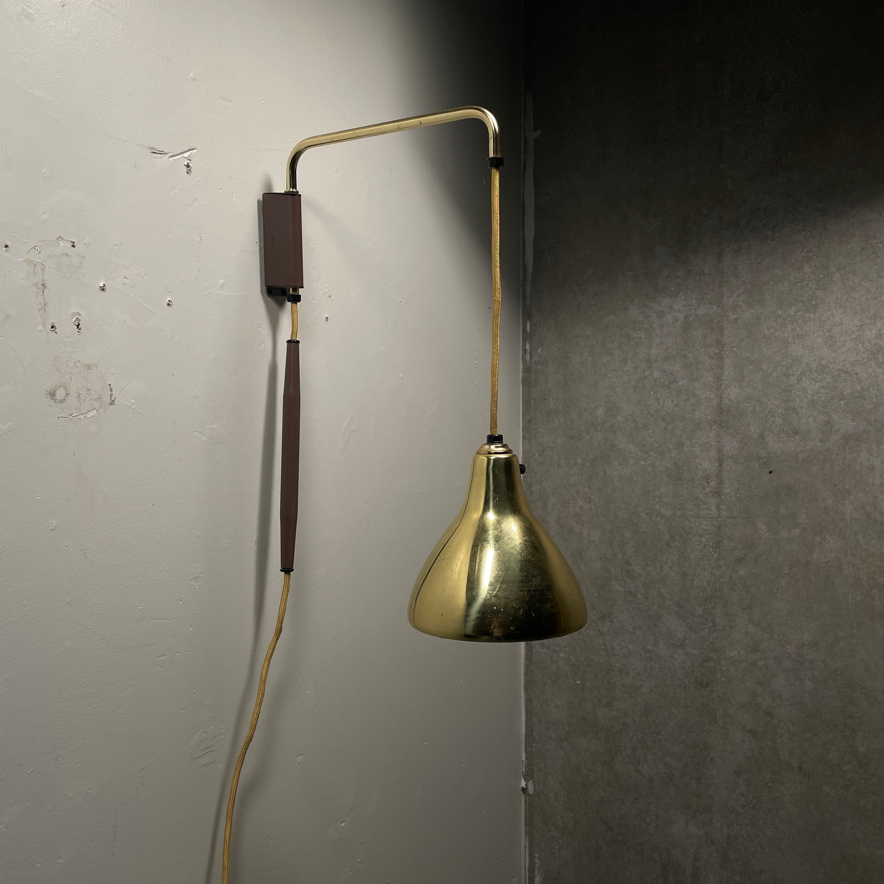 1950 Adjustable Brass Wall Mounted Light by LIGHTOLIER