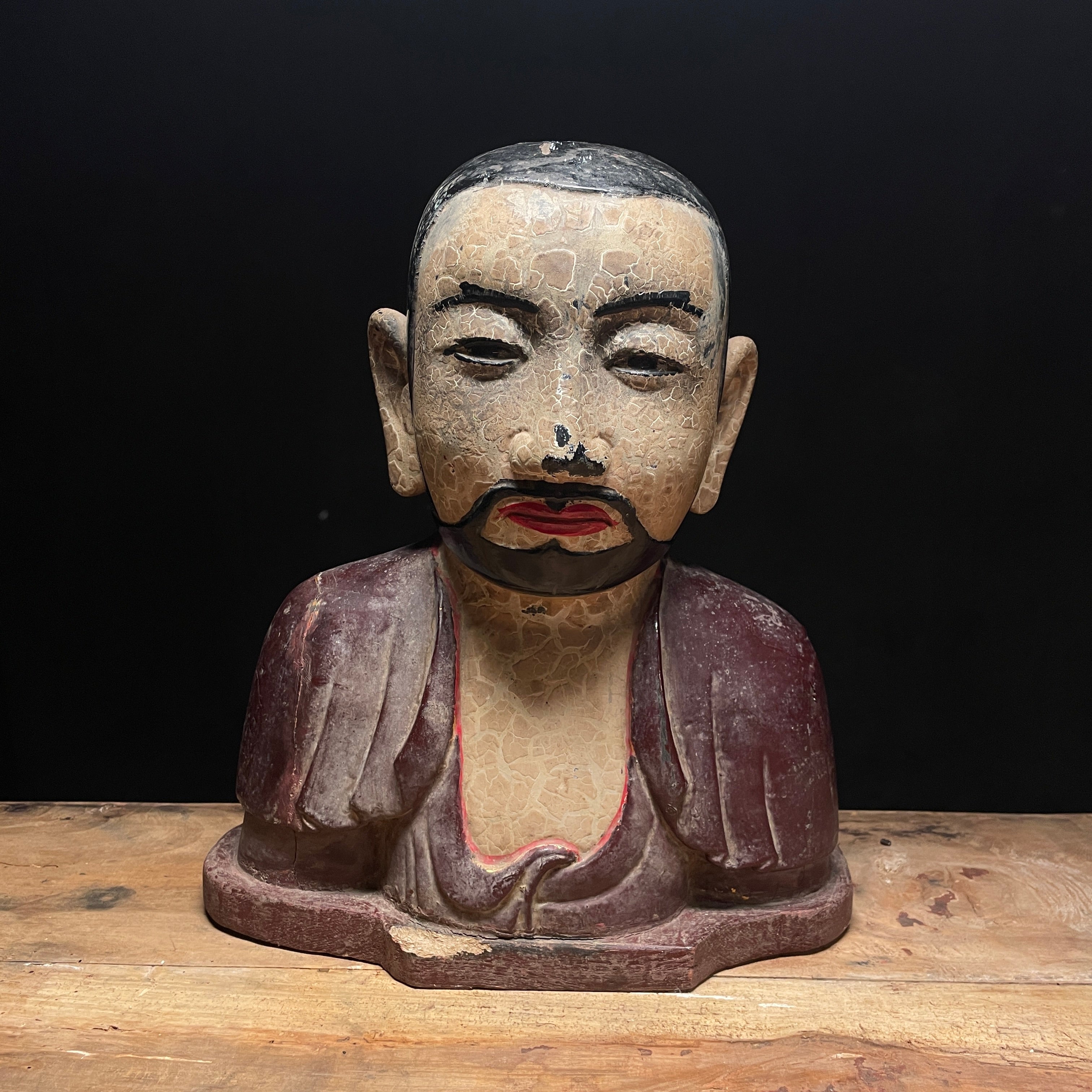 Carved Wooden Bust Featuring Asian Citizen