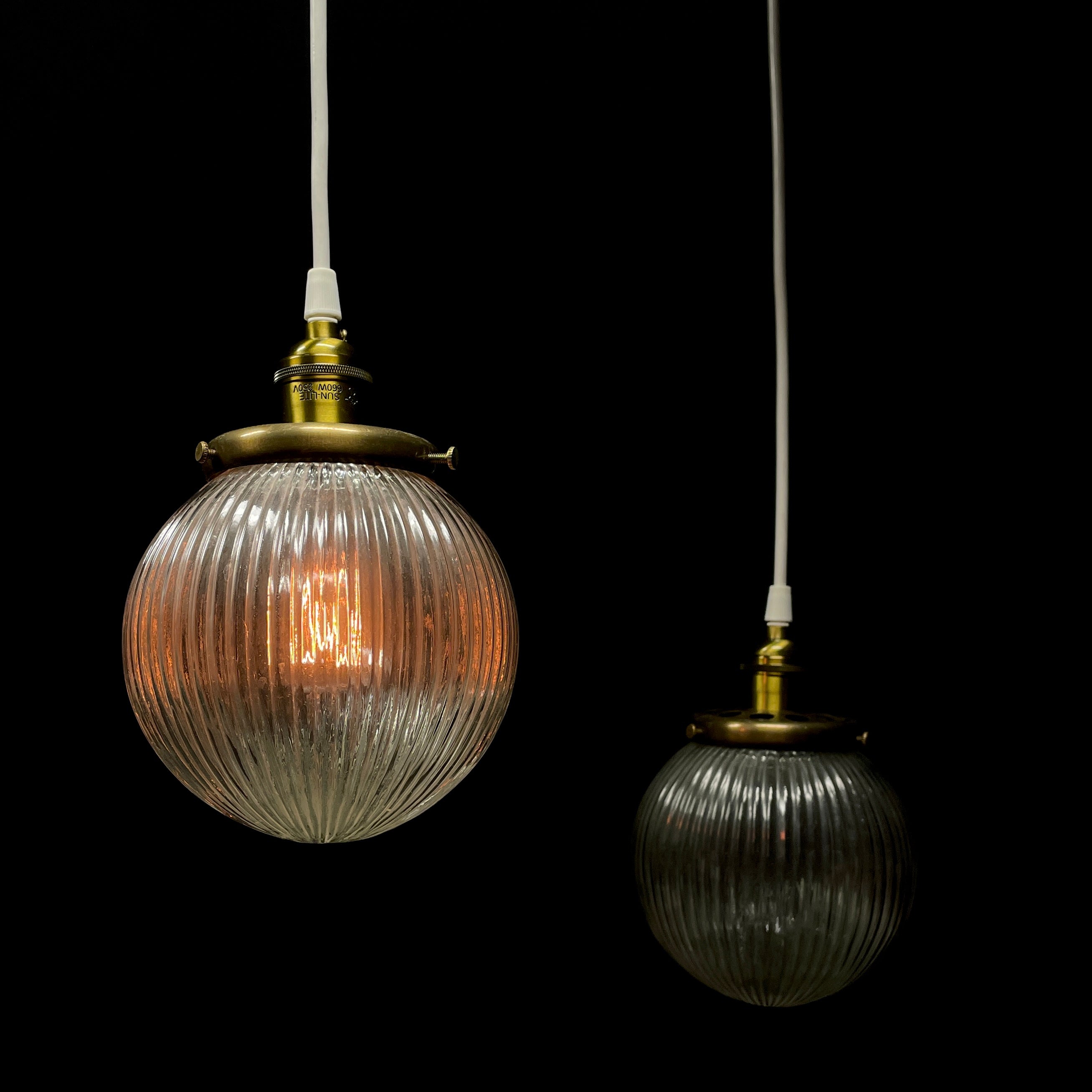 Pair of Small Brass Pendants with Ribbed Glass Globes