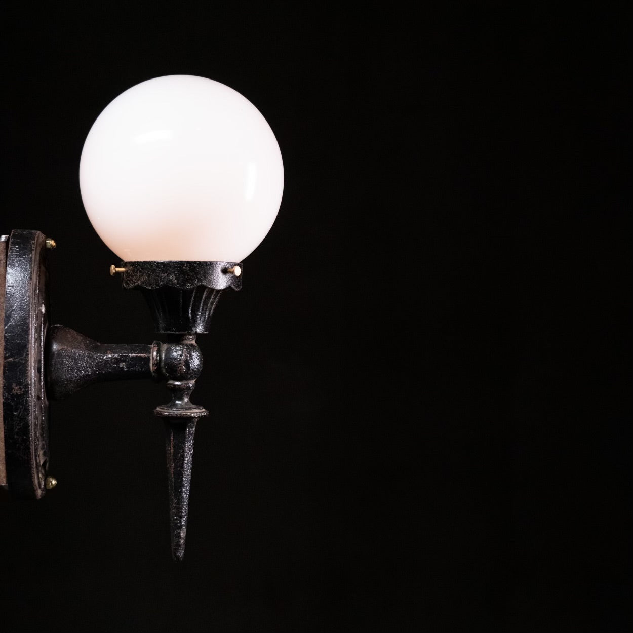 1920 Cast Iron Sconce with Milk Glass Globe