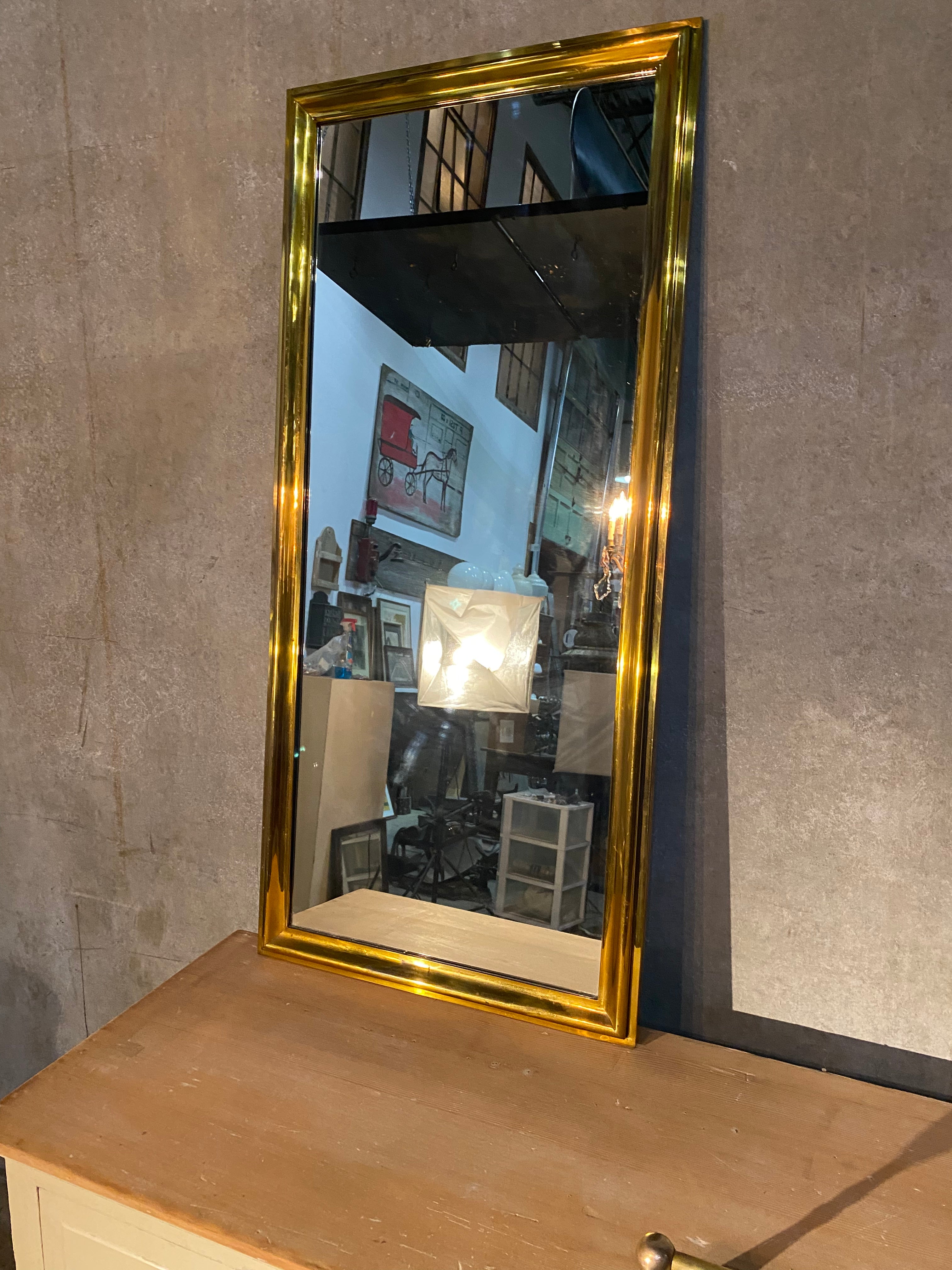 1940 solid brass mirror | Scott Landon Antiques and Interiors.