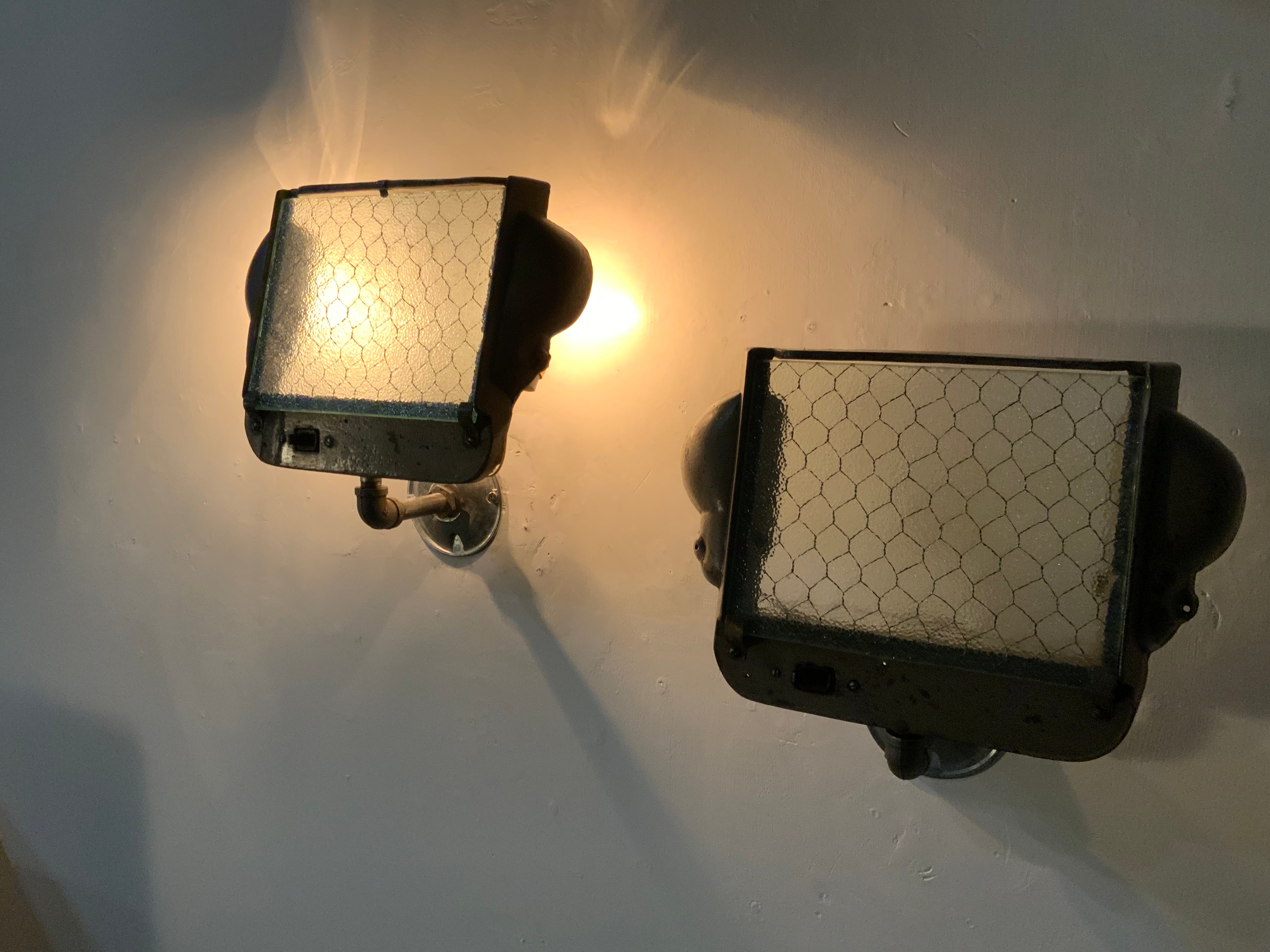 1930  industrial glass wall sconces | Scott Landon Antiques and Interiors.