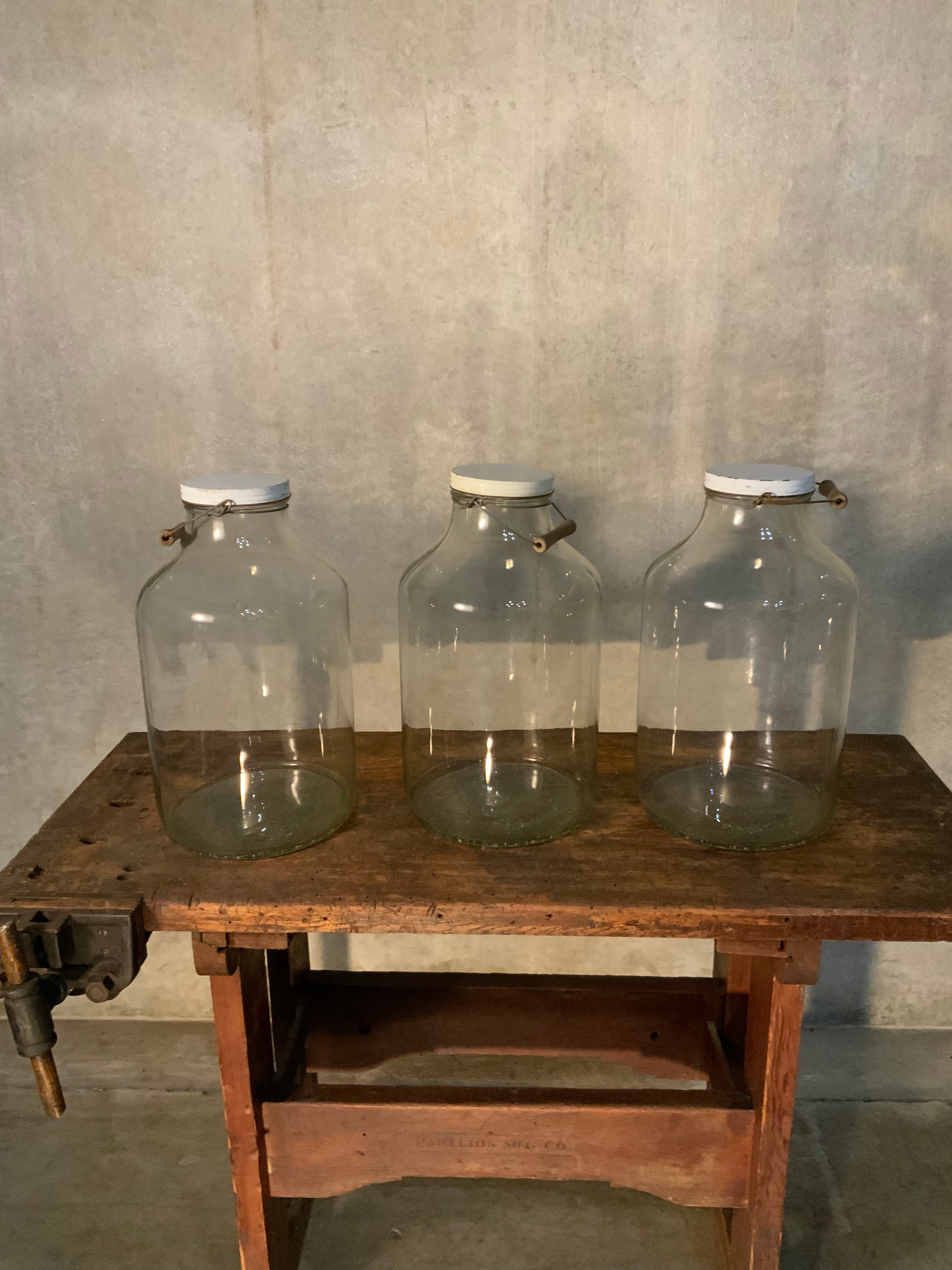 C1900 large glass GENERAL STORE supply jars | Scott Landon Antiques and Interiors.