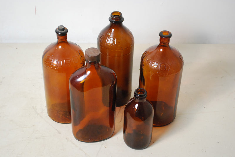 1920-30 Assorted Amber Glass Bottles | Scott Landon Antiques and Interiors.