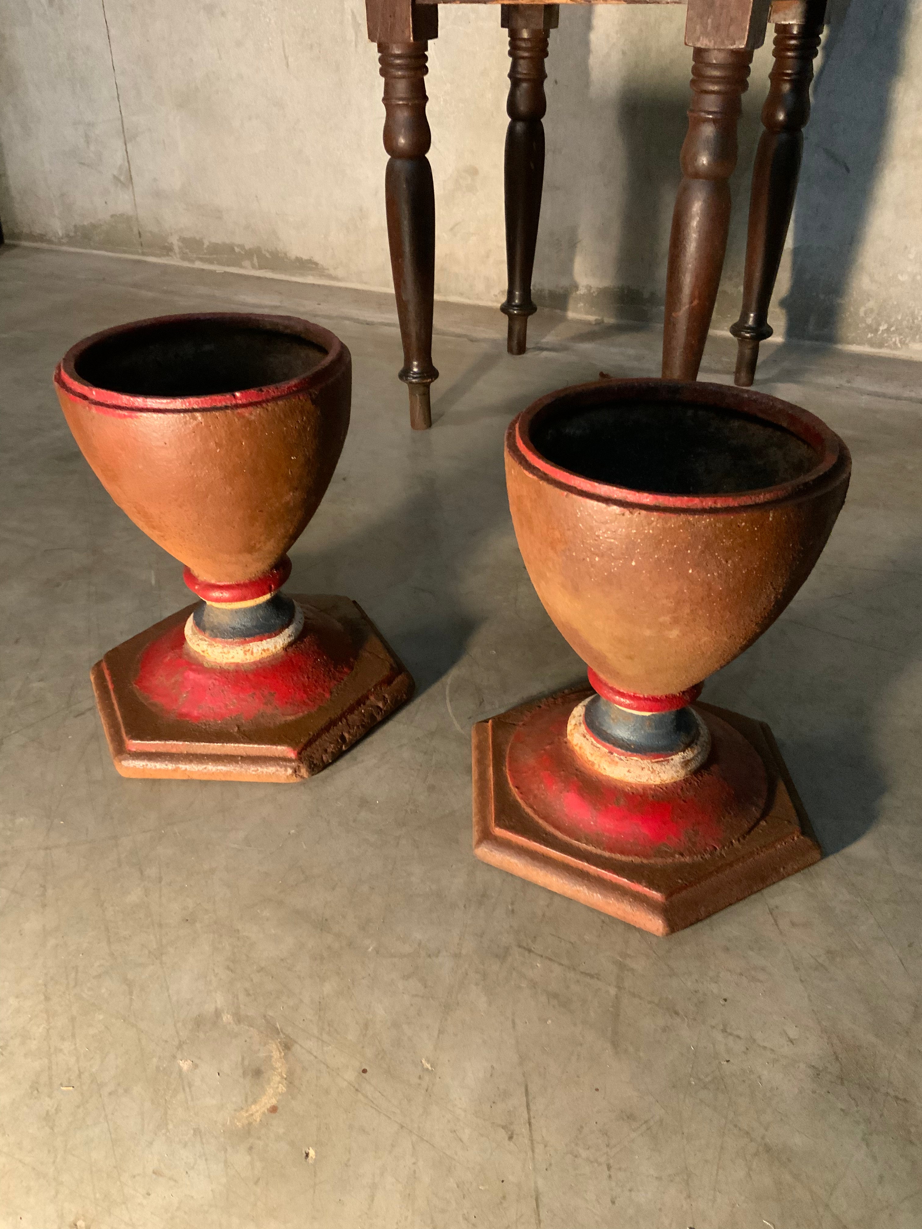 1910 cast iron urn / planters | Scott Landon Antiques and Interiors.