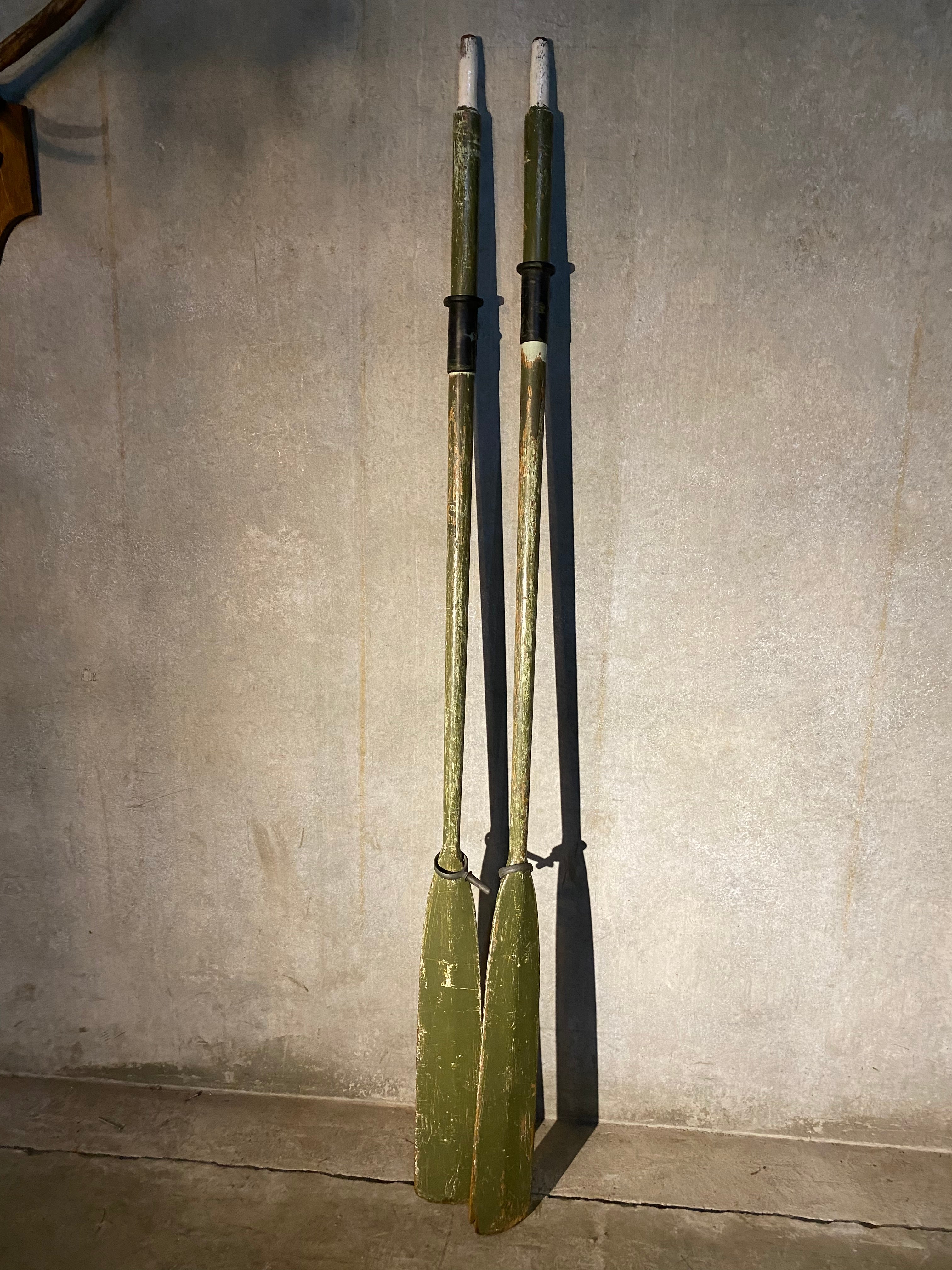 1930 wooden oars in old green paint | Scott Landon Antiques and Interiors.