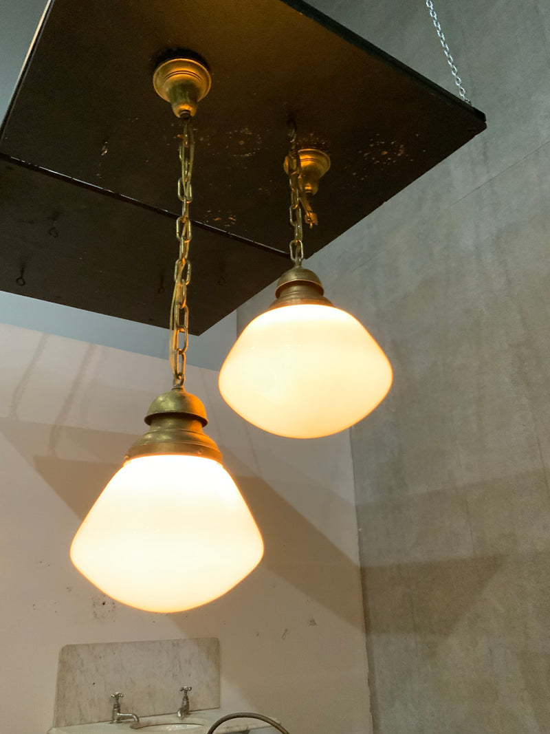 1920 strong brass SCHOOLHOUSE Style milk glass pendants | Scott Landon Antiques and Interiors.