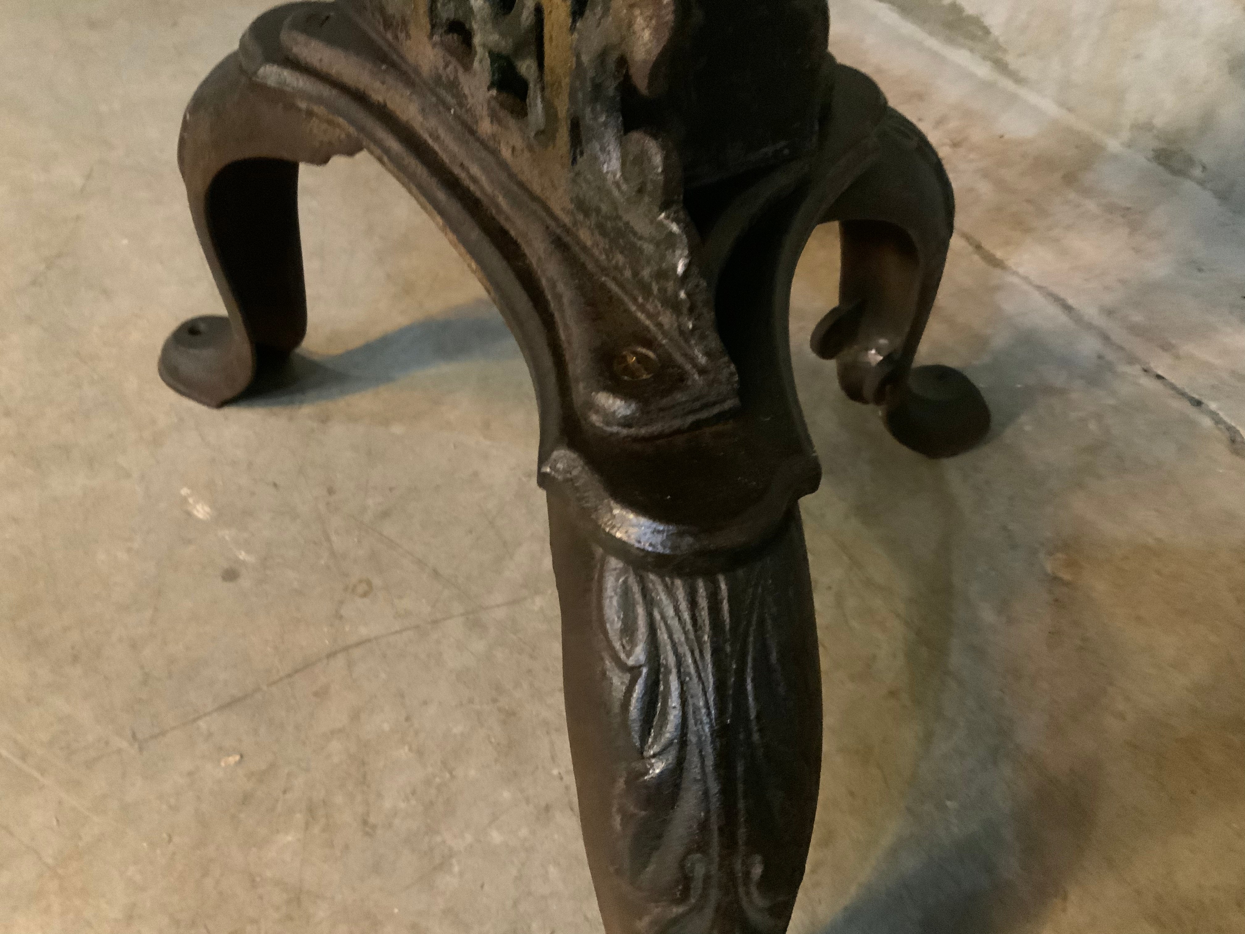 C 1900  cast iron detailed table base with marble top | Scott Landon Antiques and Interiors.