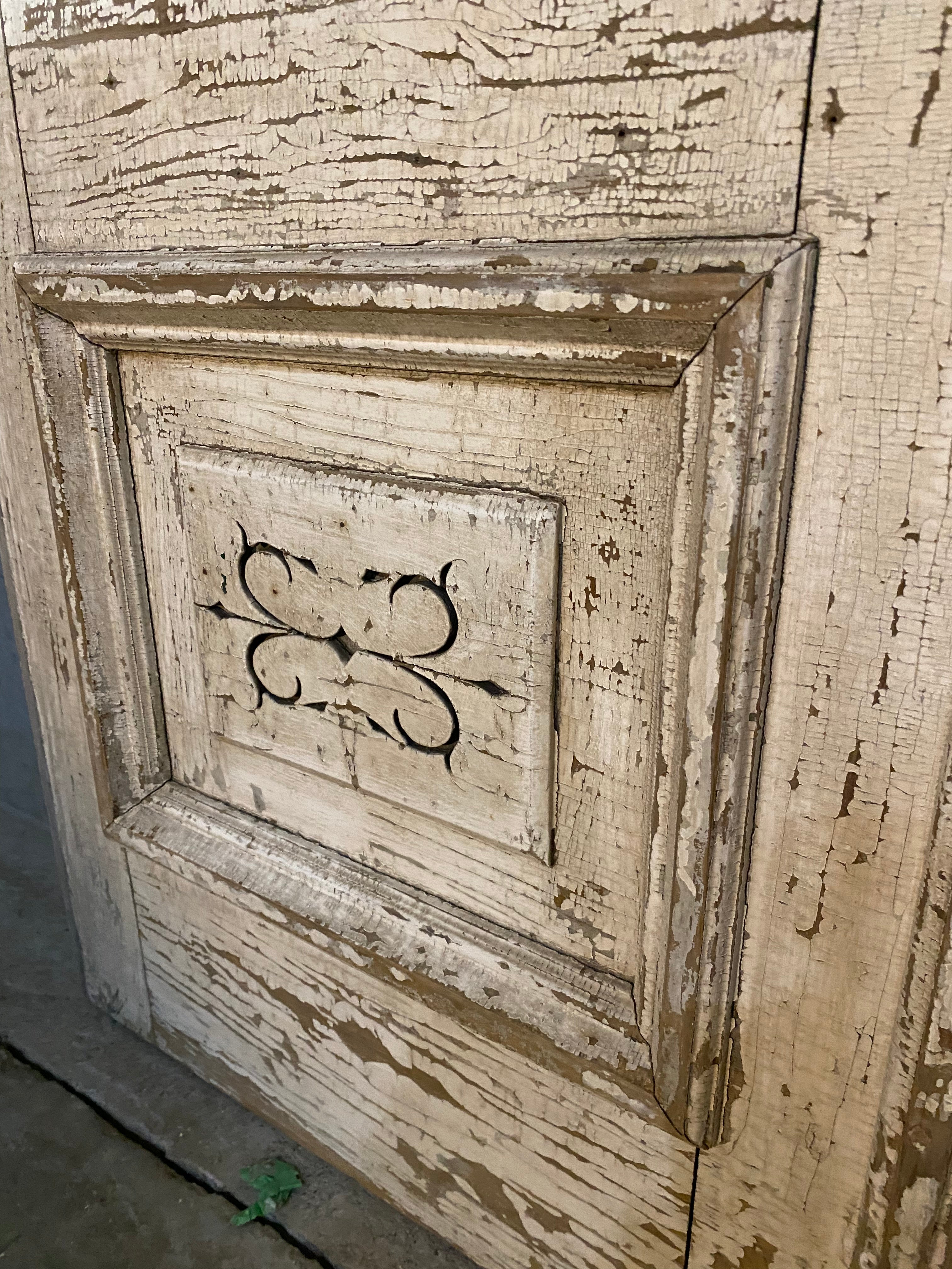 1880 pair of entry doors from in old paint  from a grey stone in CHICAGO | Scott Landon Antiques and Interiors.