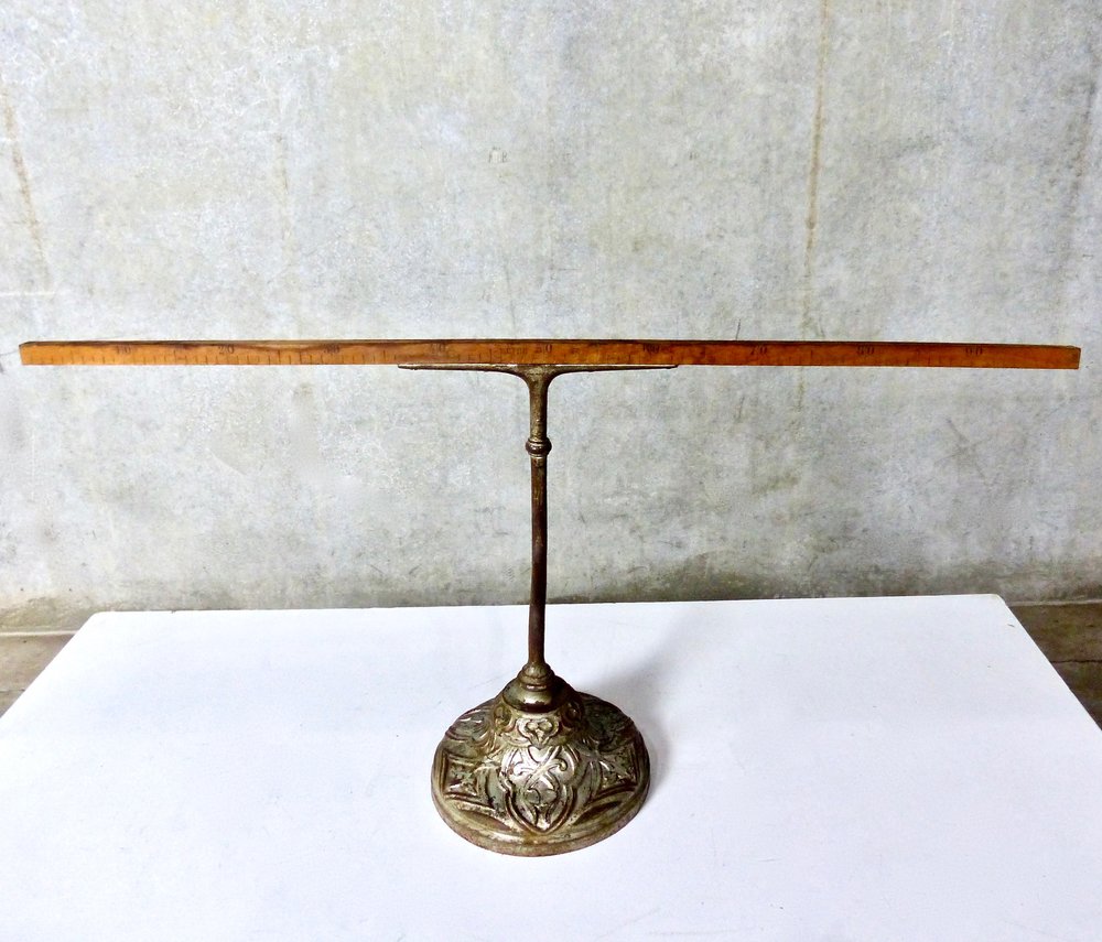 Antique Freestanding Tailor Measuring Tool with Cast Iron Base | Scott Landon Antiques and Interiors.