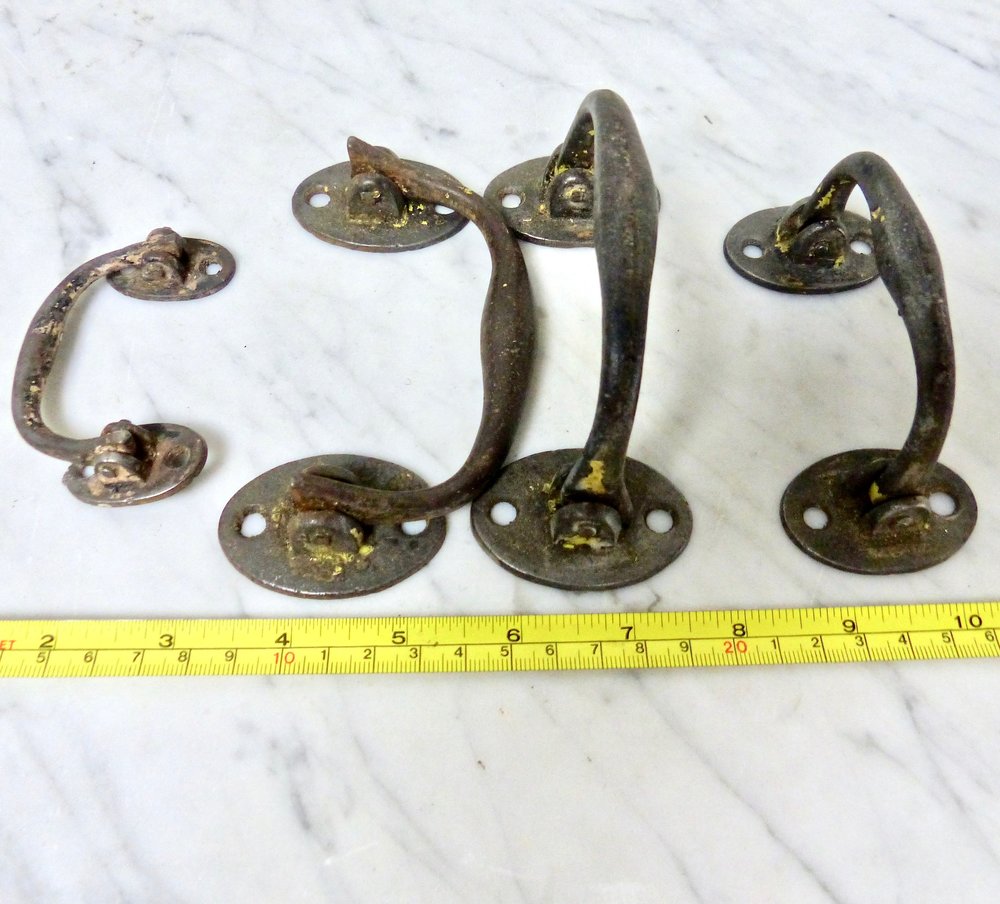 Set of Four 1920 Metal Drawer Pulls | Scott Landon Antiques and Interiors.