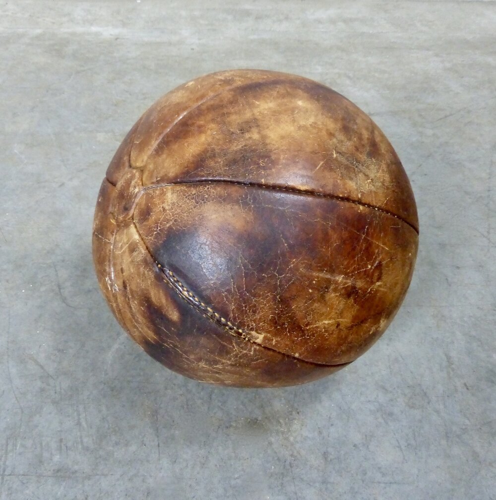 Circa 1940s Large Leather Medicine Ball | Scott Landon Antiques and Interiors.