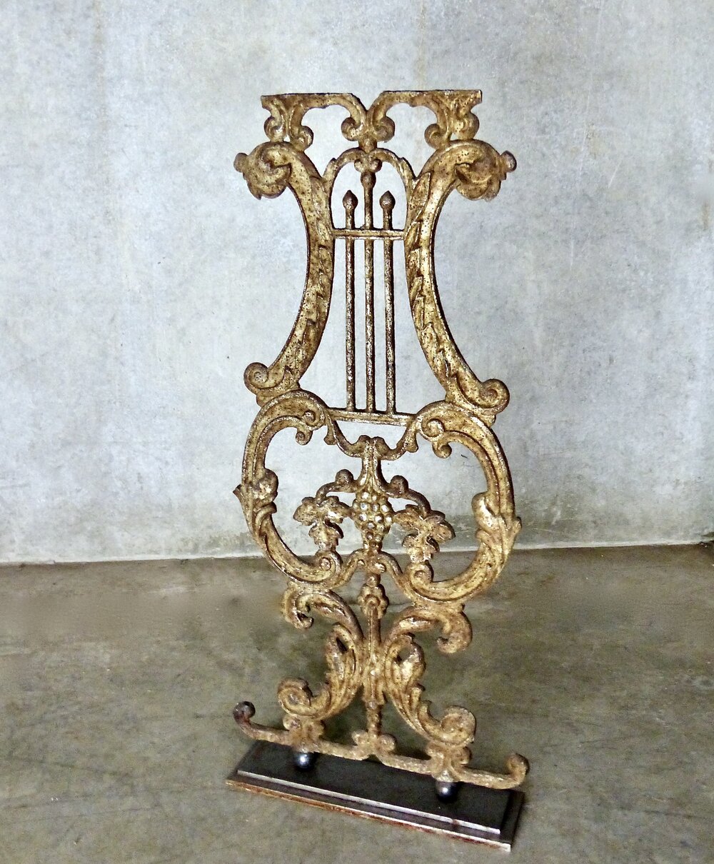 Circa 1900 Cast Iron Musical Ornament | Scott Landon Antiques and Interiors.